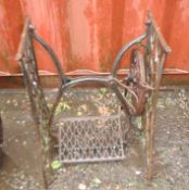 A SINGER TREADLE SEWING MACHINE BASE, without top or machine, height 72cm, Condition Report: surface