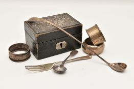 AN ASSORTMENT OF SILVERWARE, to include three napkin rings, a long handled spoon, a condiment spoon,