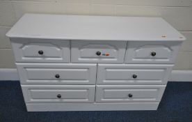 A MODERN WHITE SIDEBOARD, fitted with seven assorted drawers, length 124cm x depth 48cm x height