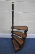 A REPRODUCTION SET OF MAHOGANY SPIRAL LIBRARY STEPS, the upright with a brass finial, each step with