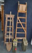 TWO VINTAGE WOODEN STEP LADDERS, the tallest being 201cm, a vintage post shovel and two 'jerry' cans