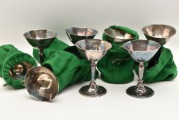 EIGHT SILVER GOBLETS, coupe style goblets knopped stem, decorative hallmarks 'PMW' London 1967