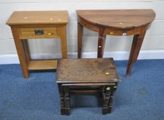 A HARD WOOD DEMI-LUNE SIDE TABLE, with a single frieze drawer, raised on square tapered legs,