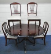 A LATE 20TH CENTURY MAHOGANY EXTENDING DINING TABLE, raised on a single pedestal with four legs,