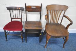 AN EARLY 20TH CENTURY OAK DESK CHAIR, with shaped open armrests, raised on front cabriole legs,