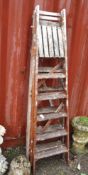 TWO VINTAGE WOODEN STEP LADDERS, the tallest being 180cm (2)
