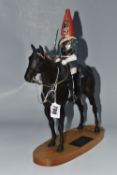 A BESWICK 'BLUES AND ROYALS' CONNOISEUR SERIES FIGURE, No. 2582 in a matt black colourway, mounted