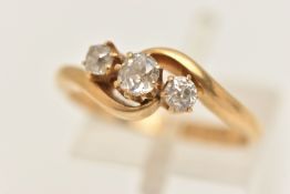 AN 18CT GOLD DIAMOND THREE STONE RING, set with three old cut diamonds, each claw set between