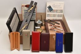 AN ASSORTMENT OF WRITTING EQUIPTMENT, to include a glass inkwell, a pewter inkwell, two parallel