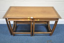 G PLAN, A MID-CENTURY TEAK NEST OF THREE TABLES, largest table width 100cm x depth 50cm x height