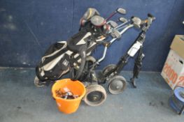 A POWAKADDY ELECTRIC GOLF TROLLEY, with battery and charger, a golf bag containing mostly Lynx clubs