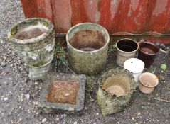 A COLLECTION OF GARDEN PLANTERS, including three round concrete planters, the tallest being 42cm