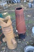 TWO CHIMNEY POTS, one with vented top and three downward spouts to body (2)