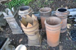 A COLLECTION OF SIX VINTAGE CHIMNEY POTS, the tallest being 78cm high (6)