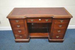 A 19TH CENTURY MAHOGANY REVERSE BREAKFRONT KNEEHOLE DESK, with a burgundy leatherette writing