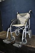 A Z-TEC FOLDING WHEELCHAIR, with two footrests