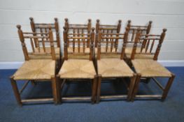 A SET OF EIGHT EARLY 20TH CENTURY OAK RUSH SEATED CHAIRS, width 52cm x depth 47cm x height 97cm,