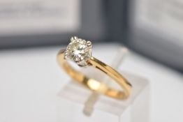 AN 18CT GOLD CERTIFIED SINGLE STONE DIAMOND RING, a round brilliant cut diamond, approximate total