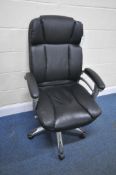 A STAPLES BLACK LEATHERETTE SWIVEL OFFICE CHAIR, width 68cm x depth 68cm x height 120cm, condition