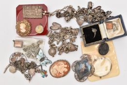 A BAG OF ASSORTED JEWELLERY, to include a silver curb link charm bracelet fitted with a heart