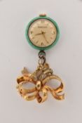 A LADIES GUILLOCHE ENAMEL FOB WATCH WITH BROOCH PIN, manual wind watch, gilt metal decorated with