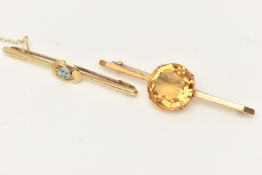 TWO YELLOW METAL BAR BROOCHES, the first set with a central circular cut Citrine, double four claw