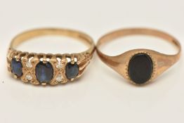 TWO 9CT GOLD RINGS, the first a small onyx set signet, hallmarked 9ct London, ring size N,