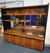 TURRI, AN ITALIAN BRIAR ELM AND EBONISED BOOKCASE, fitted with an arrangement of shelves with a