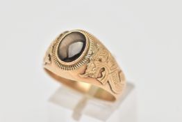 A GEM SET SIGNET, an oval cabochon stone assessed as a sapphire, collet set in yellow metal, leading