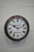 A 19TH CENTURY MAHOGANY CIRCULAR SINGLE FUSEE WALL CLOCK, the glass door enclosing a 12 inch painted