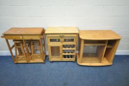 A MODERN PINE KITCHEN TROLLEY, with a drop leaf and two nesting stools, width 87cm x depth 40cm x