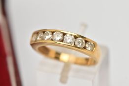 AN 18CT GOLD SEVEN STONE DIAMOND RING, seven round brilliant cut diamonds, estimated total diamond