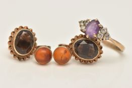A 9CT GOLD GEM SET RING AND TWO PAIRS OF EARRINGS, the ring set with a central oval cut amethyst,