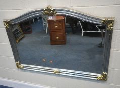 A SILVER AND GOLD PAINTED ARCHED OVERMANTEL BEVELLED EDGE WALL MIRROR, 217cm x 90cm, condition