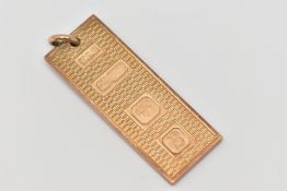 A 9CT GOLD INGOT PENDANT, of a rectangular form with engine turned pattern, hallmarked 9ct