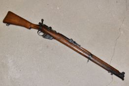A .410 LEE ENFIELD BOLT ACTION NO.1 MK III SHOTGUN, serial no. 56355G, the stock with broad arrow