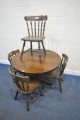A LATE 20TH CENTURY OAK CIRCULAR TABLE, raised on a single pedestal, diameter 107cm x height 75cm,