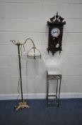 A BRASS STANDARD LAMP, with a tilting mechanism to the shade, height 144cm, along with a mirrored
