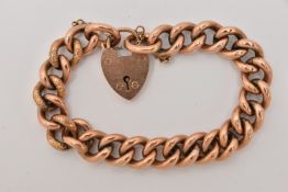A YELLOW METAL BRACELET, a rose tone hollow curb link bracelet with textured detail to the links,