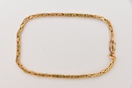 A YELLOW METAL ITALIAN CHAIN BRACELET, a byzantine chain fitted with a lobster clasp, approximate