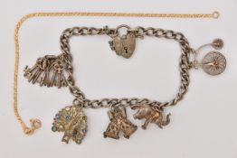 A FINE 9CT GOLD S LINK BRACELET AND A SILVER CHARM BRACELET, the S link bracelet fitted with a
