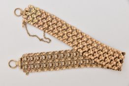 A 9CT GOLD ARTICULATED BRACELET, yellow gold wide patterned bracelet, approximate width 14mm,