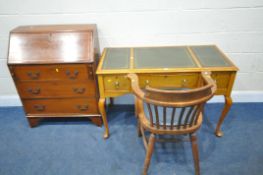 AN EARLY 20TH CENTURY KNEEHOLE DESK, with green leather writing surfaces, three drawers, raised on