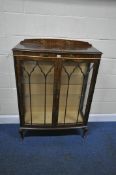 A 20TH CENTURY CHINA CABINET, with Chinoiserie patterns all over, the double glazed doors