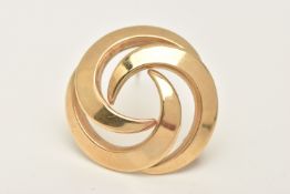A YELLOW METAL OPEN WORK BROOCH, of a circular open work form, fitted with a brooch pin and safety