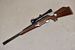 AN AIR ARMS TX200 .22 CAL / 5.5mm AIR RIFLE, serial number 93199, with under leaver action, beech