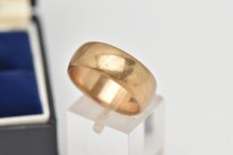A 9CT GOLD BAND RING, a wide plain polished band ring, approximate width 8mm, hallmarked 9ct