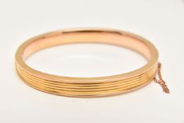 A LATE VICTORIAN 15CT GOLD BANGLE WITH COLLINGWOOD SON LTD CASE, the hinged bangle with grooved