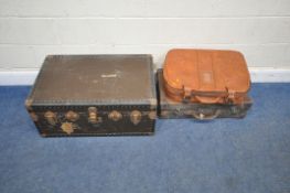 A TRAVELLING TRUNK, with twin leather handles, and studded banding, width 82cm x depth 53cm x height