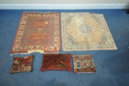 A WOOLLEN CARPET, with repeating patterns, surrounded by a multi-strap border 122cm x 116cm, another